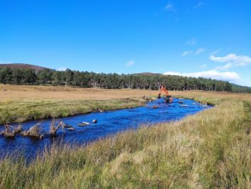 A CRC excavator working at River Muick